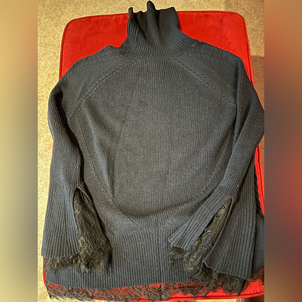Navy turtleneck sweater with lace trim